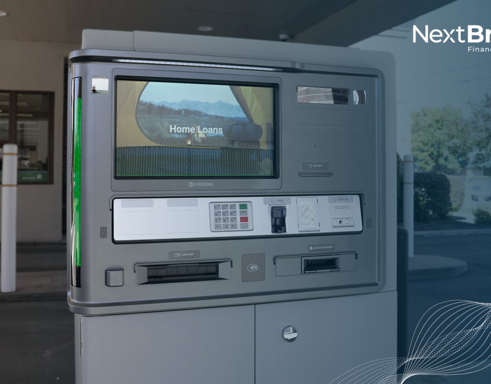 A drive-up interactive teller machine at a credit union branch, used to compare ITMs and ATMs.